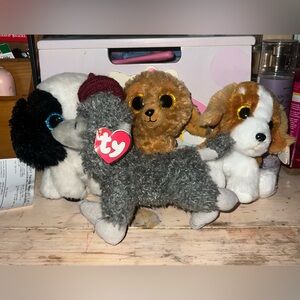 bundle of dog plushies